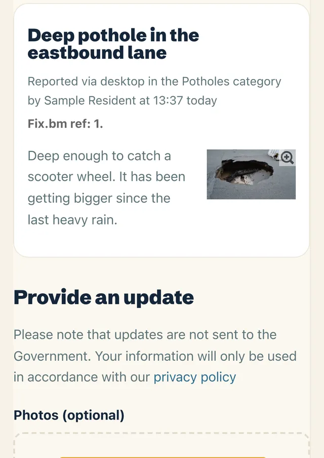 The sample pothole report on a phone